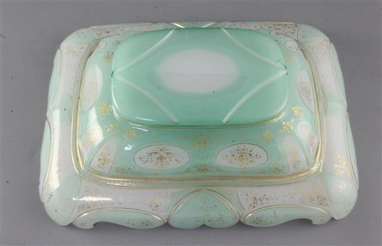 A Bohemian green tinted opaline glass dish, second half 19th century, made for Turkish market, length 33cm